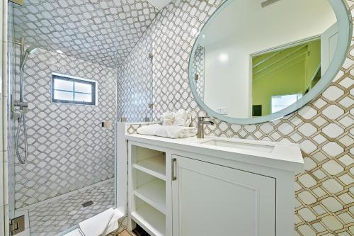 a bathroom with a sink and a mirror at On The Beach Casita in San Diego