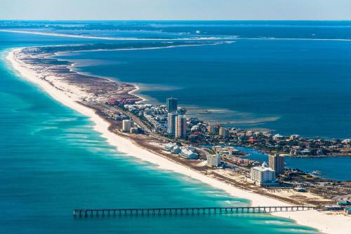 an aerial view of a beach and the ocean at Santa Rosa Dunes 425 in Pensacola Beach