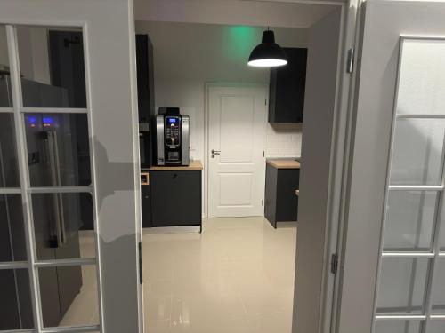 Kuchyň nebo kuchyňský kout v ubytování Pensiunea La Brazi