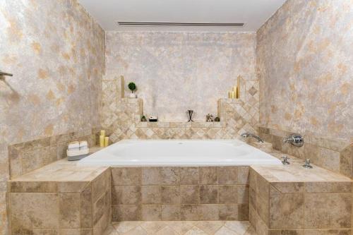 a large bathroom with a large tub in a room at Hunter Mountain Ski House - A Cozy Retreat by the Slopes in Hunter