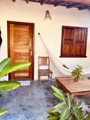 Ruang duduk di Pousada Vila Dendê