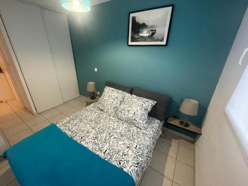 Posteľ alebo postele v izbe v ubytovaní Charmant Appartement Cosy sur Sète proche de toutes commodités, Parking Privé