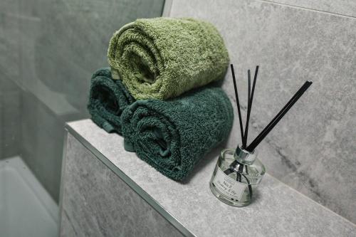 a couple of towels on a counter in a bathroom at The Varsity Studios in Nottingham