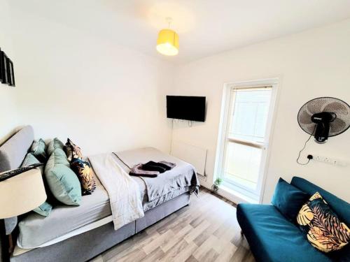 Oleskelutila majoituspaikassa One bedroom apartment with a terrace in Angel (Islington)!