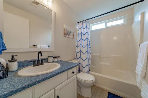 a bathroom with a sink and a toilet and a shower at Cozy Home, Close to Ocean and Redwoods in McKinleyville