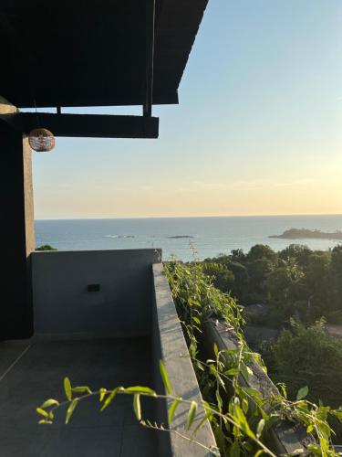 a view of the ocean from a house at Kapaliya Unawatuna in Unawatuna