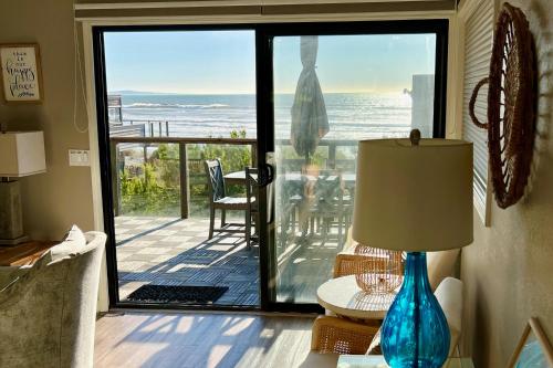 a living room with a view of the ocean at Idyllic Ocean-View Oasis in Watsonville