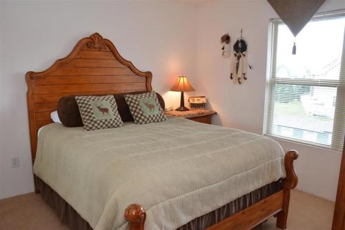 Ένα ή περισσότερα κρεβάτια σε δωμάτιο στο Seven Springs Woodridge 4 Bedroom Premium Condo, Mountain Views and Sleeps 10! condo