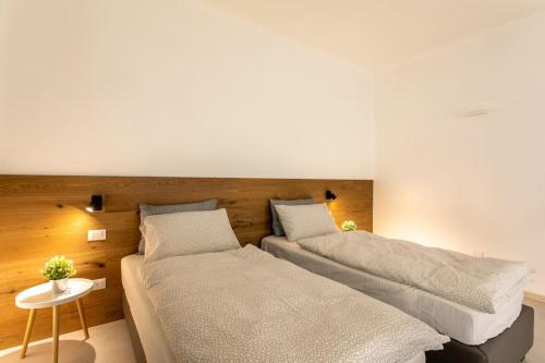 Ένα ή περισσότερα κρεβάτια σε δωμάτιο στο C-Apartments
