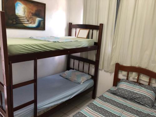 a couple of bunk beds in a room at Betesda 2197F in São Luís