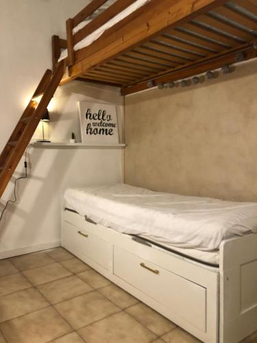 a bed in a room with a mattress on it at Studio Saint merry Fontainebleau in Fontainebleau