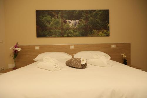 Ένα ή περισσότερα κρεβάτια σε δωμάτιο στο Bed and Breakfast Dimora Peluso