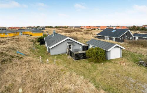an overhead view of a group of houses in a field at Amazing Home In Thisted With Sauna in Torsted