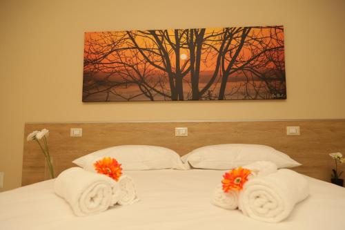 Ένα ή περισσότερα κρεβάτια σε δωμάτιο στο Bed and Breakfast Dimora Peluso