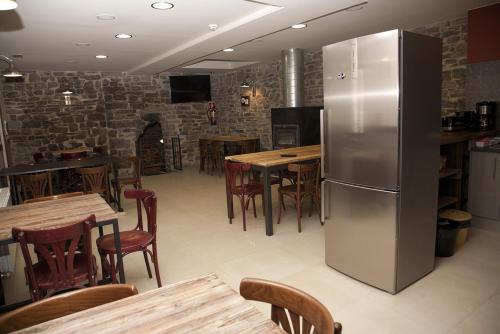 Kuchyň nebo kuchyňský kout v ubytování Hostel-Albergue Monte Perdido