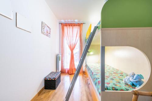 a small room with a bunk bed and a staircase at Casa Ricale in Terra Mala