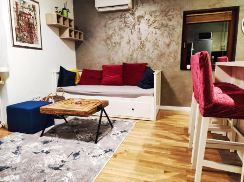 a living room with a couch and a table at Apartment Dada in Zagreb