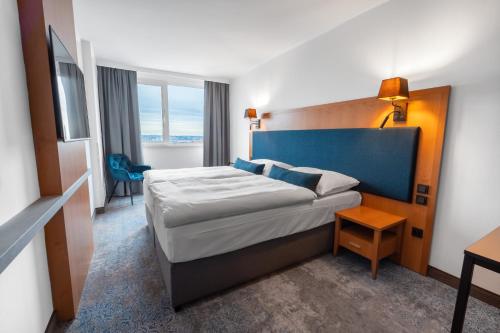 Cama o camas de una habitación en OREA Hotel Pyramida Praha