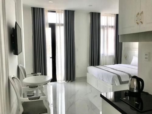 Postel nebo postele na pokoji v ubytování PARIS HOTEL