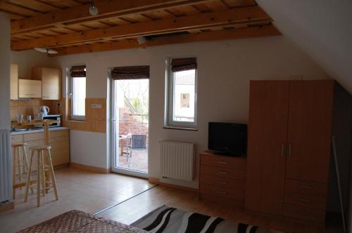 Kuchyň nebo kuchyňský kout v ubytování Maya Guesthouse