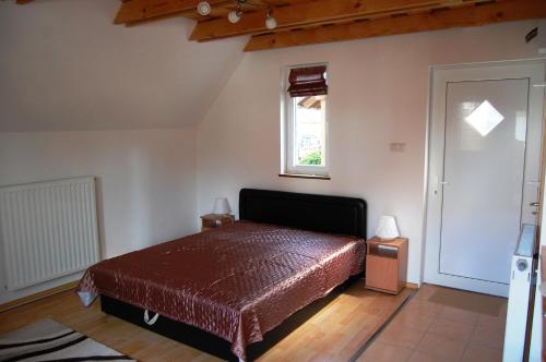 Postel nebo postele na pokoji v ubytování Maya Guesthouse