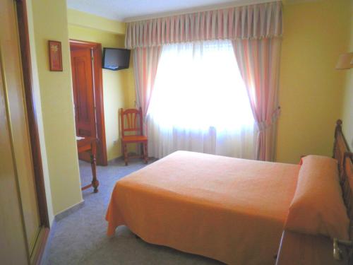 Katil atau katil-katil dalam bilik di Hotel La Costera