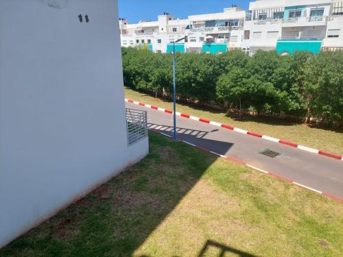 a view from the balcony of a building at Appartement avec piscine in Mohammedia