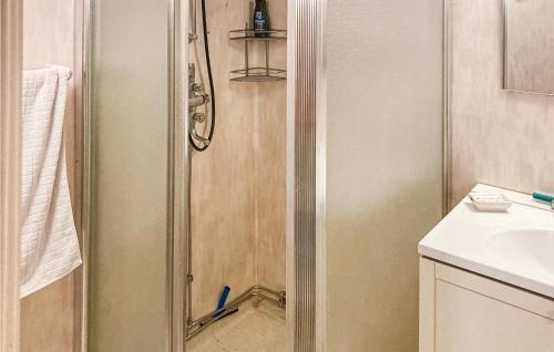 a shower with a glass door in a bathroom at 2 Bedroom Stunning Home In Lima in Lima