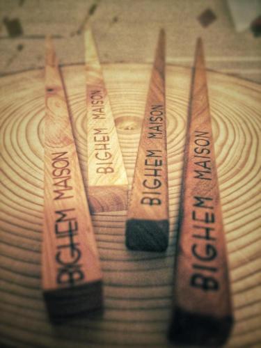 a group of four wood sticks with different writing on them at Bighem Maison 2 in Izumi-Sano