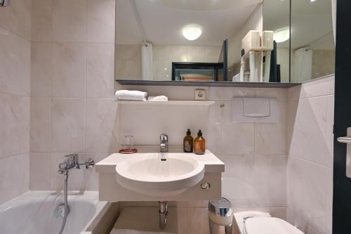 Un baño de Hotel Sonne