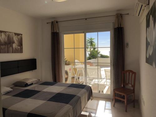 Katil atau katil-katil dalam bilik di Amazing apartment in Puerto Alto