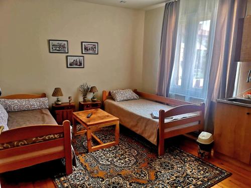 Posteľ alebo postele v izbe v ubytovaní Konak -Guest house -Ramonda Serbika