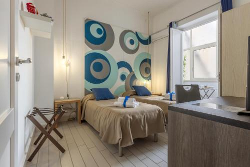A bed or beds in a room at B&B Massimocentro
