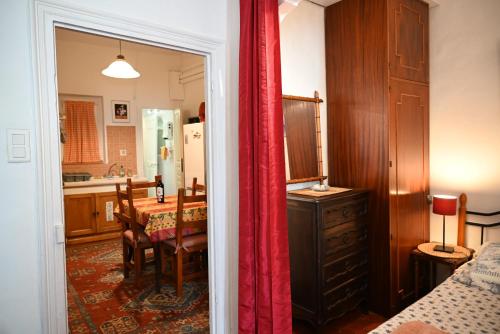 a kitchen and dining room with a table and a dining room at Family Apartment Old Town near Beach AC in Nice