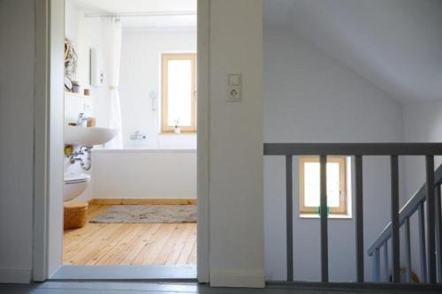 a bathroom with a sink and a bath tub at Lichtzeit in Mauth