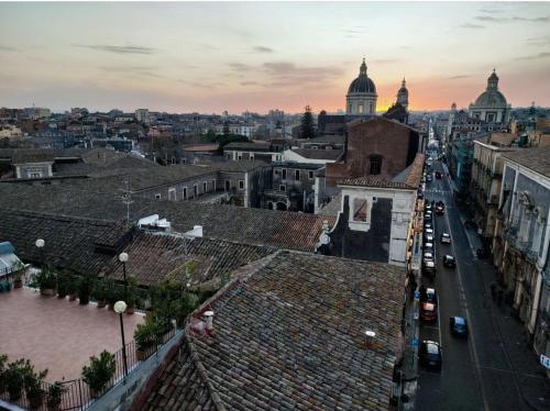 a view of a city from the roof of a building at Hotel Biscari in Catania