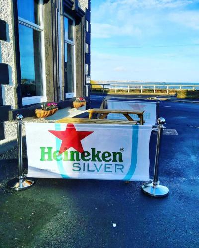 a sign for ahaven silver on the side of a building at The Waterford Arms in Hartley