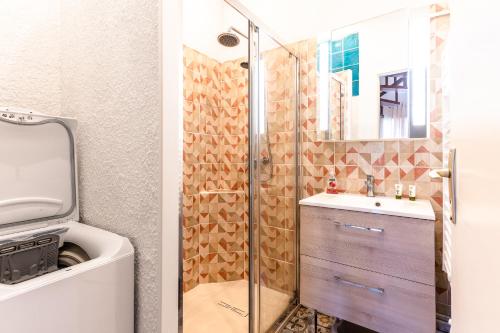 Et badeværelse på Maisonnette Biscarosse