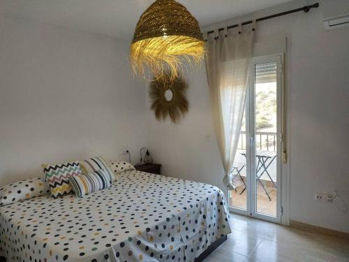 Кровать или кровати в номере Acogedor duplex para parejas en La Isleta