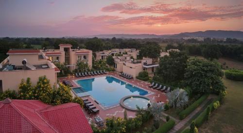 an aerial view of a house with a swimming pool at Jungle Vilas in Sawāi Mādhopur