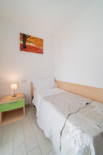 Postel nebo postele na pokoji v ubytování Residenza Monica