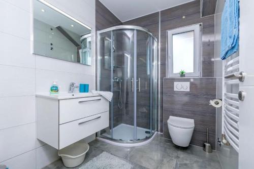 Koupelna v ubytování Apartments SIME