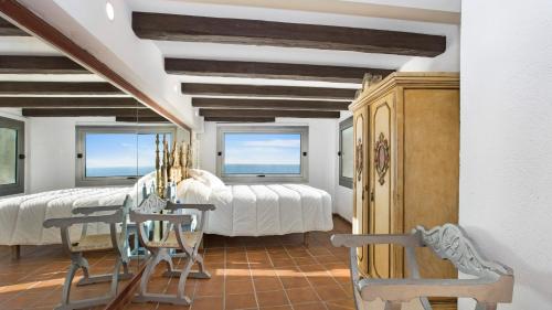 Postel nebo postele na pokoji v ubytování 2Cany - Casa de lujo en la Costa Brava