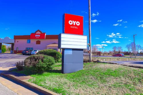 a sign in front of a woco gas station at OYO Hotel Brownsville TN I-40 in Brownsville