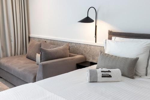 Cama o camas de una habitación en 11Suites