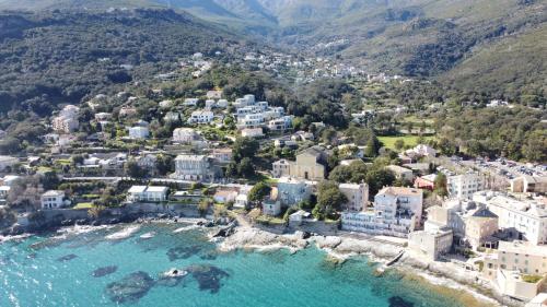 an aerial view of a town next to the water at VILLA ELBA in Brando