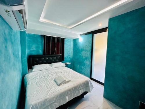 Postel nebo postele na pokoji v ubytování Keyman House Khao Yai