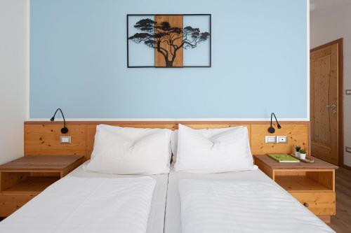 Ένα ή περισσότερα κρεβάτια σε δωμάτιο στο Grünwald