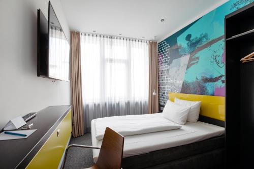 Televiisor ja/või meelelahutuskeskus majutusasutuses Hotel Berlin, Berlin, a member of Radisson Individuals