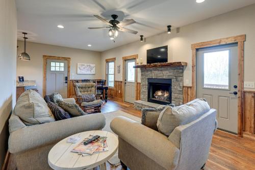a living room with two couches and a fireplace at Smoky Mountain Cabin Rental Game Room, Fire Pit! in Andrews